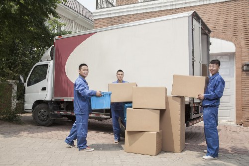 Professional movers loading household furniture for a Cannhall home removal