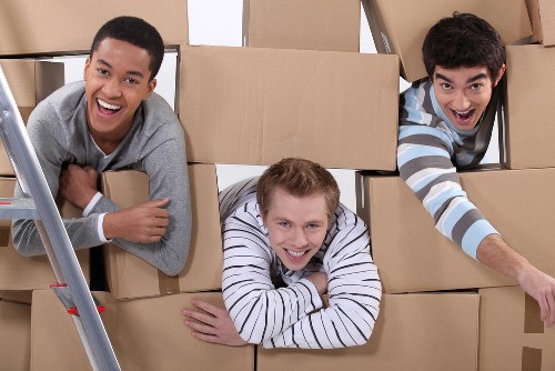 Household items and furniture prepared for transport by removal van
