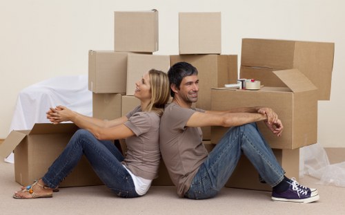 Local movers handling furniture during a Cannhall relocation