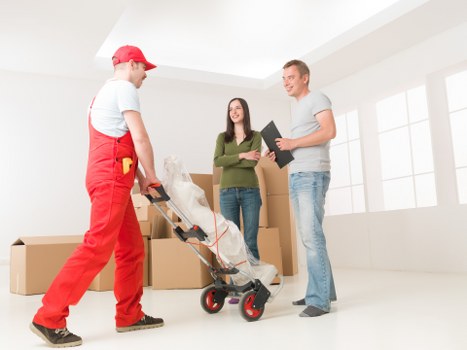 Moving team planning a house relocation with careful access considerations