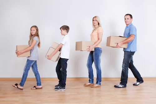 Local moving helper navigating a Cannhall residential street