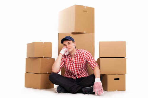Furniture and boxes being loaded for transport in Cannhall